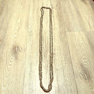 Handmade necklace. Silver color.